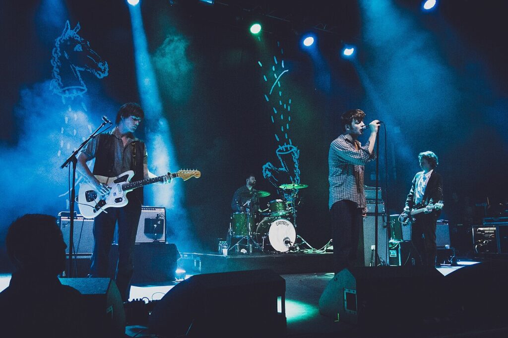 Fontaines D.C. on stage in blue light
